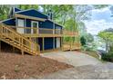 Two-story home featuring a spacious deck, ideal for entertaining and enjoying the scenic surroundings at 2066 Marquesas Ave, Fort Mill, SC 29708