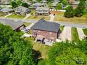Aerial view of the brick home with a patio and outdoor seating area in a neighborhood at 2808 Park Ridge Blvd, Rock Hill, SC 29732