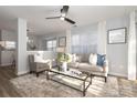 Bright living room featuring neutral tones, stylish furnishings, and lots of natural light at 501 Olmsted Park Pl # N, Charlotte, NC 28203