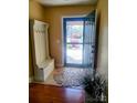Inviting foyer features a coat rack with bench and a view of the landscaped front yard at 811 Wynnshire Dr # A, Hickory, NC 28601