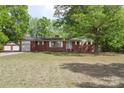 Spacious brick home on a beautiful lot with mature trees at 1099 S Potter Rd, Lancaster, SC 29720
