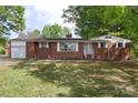 Charming brick home with spacious front yard at 1099 S Potter Rd, Lancaster, SC 29720