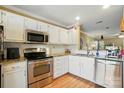 Well-equipped kitchen featuring stainless steel appliances and a convenient layout at 9036 Four Mile Creek Rd, Charlotte, NC 28277