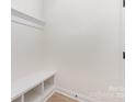 Mud room featuring a white bench with open shelving and neutral paint at 120 Southern Oaks Ln, Salisbury, NC 28147