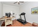 Bright office space featuring hardwood floors and a ceiling fan at 2425 Orofino Ct, Charlotte, NC 28269
