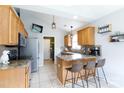 Functional kitchen featuring stainless steel appliances, breakfast bar and a neutral color scheme providing a modern touch at 5015 Drake Pond Ln, Rock Hill, SC 29732