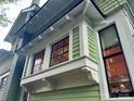 Exterior window detail showcasing architectural design with white trim and black window frames at 1000 Margaret Brown St, Charlotte, NC 28202
