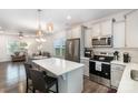 Modern kitchen featuring stainless steel appliances and a central island at 101 Glencroft Dr, Wingate, NC 28174