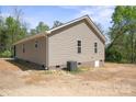 Exterior view of home showcasing its modern siding and well-maintained backyard at 2518 Glenwood St, Kannapolis, NC 28083