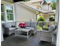 Welcoming porch area with comfortable seating, ideal for enjoying the outdoors at 1550 Matthew Mcclure Cir, Davidson, NC 28036