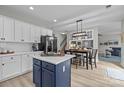 Bright eat-in kitchen with pendant lighting, stainless appliances and eat in kitchen table at 1809 Robbins Meadows Dr, Waxhaw, NC 28173