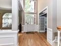 Bright foyer featuring hardwood floors and ample natural light at 7012 Chadwyck Farms Dr, Charlotte, NC 28226