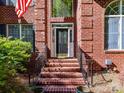 Close-up view of brick steps and front door at 7012 Chadwyck Farms Dr, Charlotte, NC 28226
