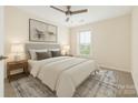 Cozy bedroom featuring neutral tones, a comfortable bed, and a serene ambiance at 23112 Clarabelle Dr, Charlotte, NC 28273