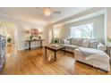Spacious living room with hardwood floors, cozy seating, and ample natural light at 3510 Conway Ave, Charlotte, NC 28209