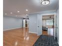 Bright living room featuring hardwood floors and open entryway to dining and living areas at 4256 Wood Forest Dr, Rock Hill, SC 29732
