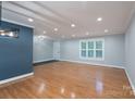 Spacious living room features newly finished floors and trim at 4256 Wood Forest Dr, Rock Hill, SC 29732