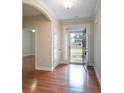 Bright foyer with hardwood flooring and views of the front yard at 5135 Norway Ln, Rock Hill, SC 29732