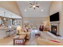 Bright living room boasts a fireplace, vaulted ceilings and an open floor plan at 1016 Secretariat Dr, York, SC 29745