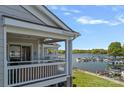 Scenic view from condo balcony overlooking the lake and boat docks at 1211 Torrence Cir, Davidson, NC 28036