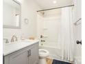 Bright bathroom with a tub and shower combo, modern vanity, and updated fixtures at 2313 Glenwood St, Kannapolis, NC 28083
