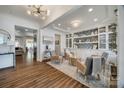 Bright living room boasting hardwood floors, built-in shelving, and stylish seating arrangements for entertaining at 4032 Wild Turkey Ln, Indian Land, SC 29707