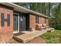 Inviting front porch featuring comfortable benches and decorative accents, perfect for relaxation at 1218 Donna Dr, Shelby, NC 28152