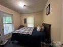 Bedroom with a comfortable bed and neutral decor at 267 Hall Nw Ave, Concord, NC 28027