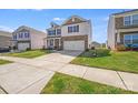 Pleasant two-story home with a brick-accented facade, two-car garage, and well-kept lawn in a residential neighborhood at 3286 Shining Rock Sw St, Concord, NC 28027