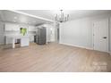 Open-concept home with kitchen, dining and living areas provides ample room at 3715 Dallas High Shoals Hwy, Dallas, NC 28034