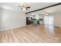 Open-concept living area flowing into a modern kitchen with stainless steel appliances at 4303 Greenhaven Ln, Gastonia, NC 28056