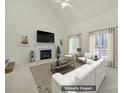 Bright living room featuring a marble fireplace, neutral furniture, and an elegant vaulted ceiling at 7935 Harrington Woods Rd, Charlotte, NC 28269