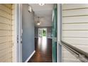 Foyer with wood flooring flowing to a spacious living area at 113 Hidden Creek Dr, Salisbury, NC 28147