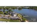 Scenic aerial view of waterfront condos and a lakeside restaurant, Eddies, on Lake Norman at 143 S Gibbs Rd, Mooresville, NC 28117