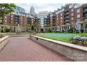 Well-maintained courtyard with fountain, putting green and beautiful landscaping at 300 W 5Th St # 136, Charlotte, NC 28202