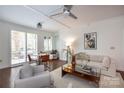 Bright living area featuring hardwood floors and neutral decor and dining nook at 300 W 5Th St # 136, Charlotte, NC 28202