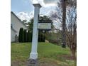 A photo showcasing the community entrance sign with a well-manicured lawn at 464 Laurel Fork Dr, Fort Mill, SC 29715