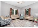 Bright living room with neutral walls, hardwood flooring, and ample natural light at 745 6Th Sw Ave, Hickory, NC 28602