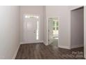 Inviting foyer with hardwood floors, a white front door, and ample natural light at 184 Swann Rd # 1, Statesville, NC 28625