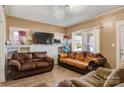 Well-lit living room offering hardwood floors and built-in shelving for added convenience at 21 W D St, Newton, NC 28658