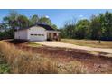 Charming single-story home with a covered front porch and an attached two-car garage on a spacious lot at 4168 S Olivers Cross Rd # 6, Newton, NC 28658