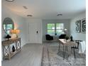 Bright and airy living area featuring neutral walls, modern decor, and stylish furnishings at 1177 Ellis Pond Dr, Rock Hill, SC 29730