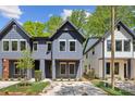 New construction homes with modern architecture, neutral colors, and well-maintained landscaping at 2008 St John St, Charlotte, NC 28216
