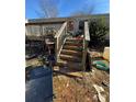 Exterior view of back porch, stairs, and door to mobile home at 2504 Windswept Way, Rockwell, NC 28138