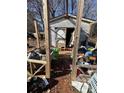 Exterior view of run-down, dilapidated shed in disrepair at 2504 Windswept Way, Rockwell, NC 28138
