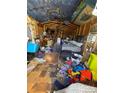 Interior shot of a run-down, dilapidated shed in disrepair at 2504 Windswept Way, Rockwell, NC 28138