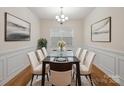 Elegant dining room with modern table, chairs, chandelier, and stylish decor at 527 Livingston Dr, Lancaster, SC 29720