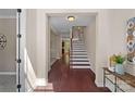Inviting foyer boasts hardwood floors and staircase leading to the second floor of the home at 3060 Drummond Ave, Indian Land, SC 29707
