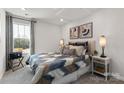Comfortable bedroom featuring neutral carpet and great natural light at 3790 Backwater St, Concord, NC 28027