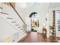 Bright foyer with hardwood floors, staircase, and soaring ceilings for a grand entrance at 1103 Hillcrest Ridge Dr, Salisbury, NC 28146